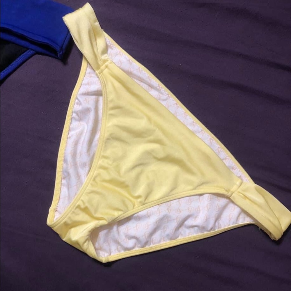 Yellow VS bathing suit bottoms